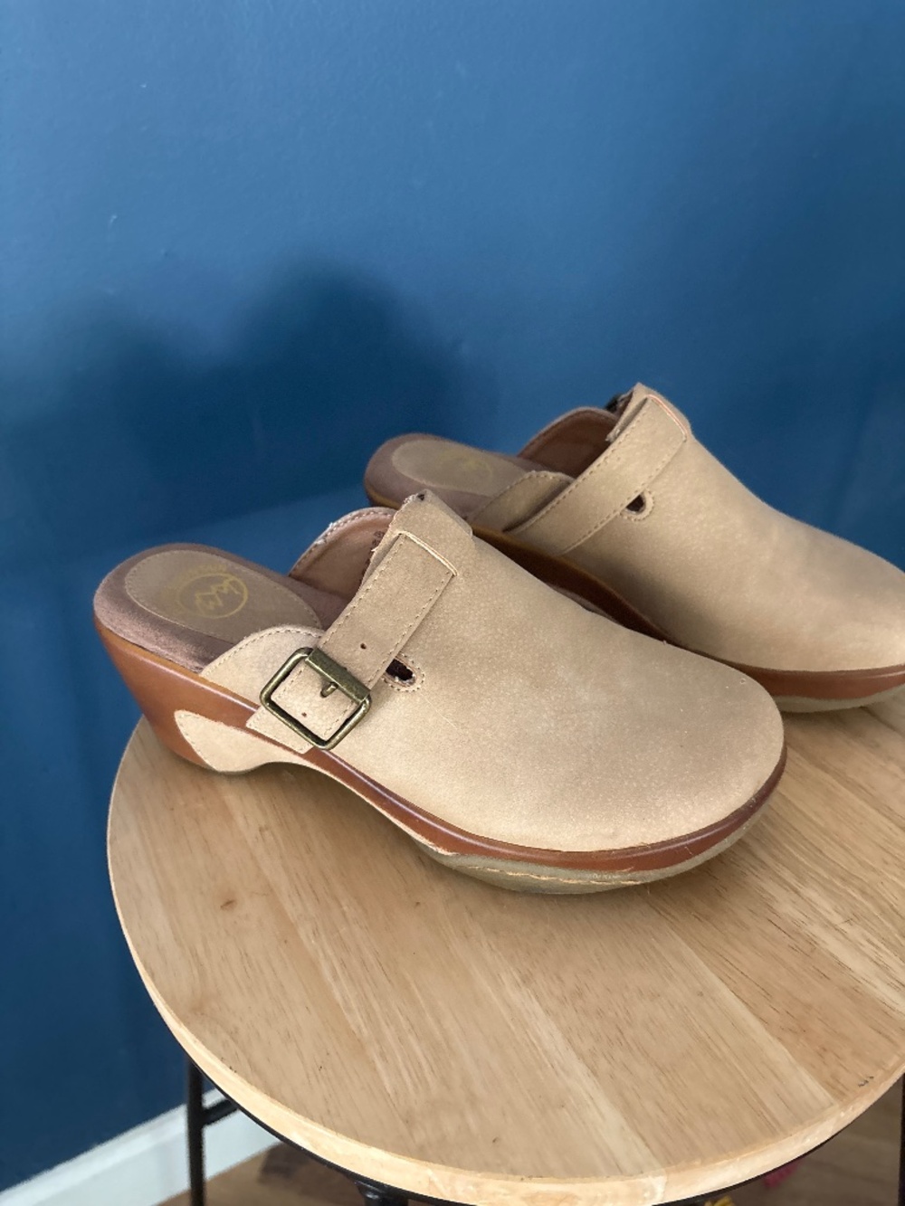 Woman’s suede clogs